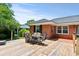 Outdoor patio with a dining table, set with chairs, perfect for outdoor gatherings and dining at 1008 N Withlacoochee Ave., Marion, SC 29571