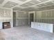 Spacious living room under construction with a fireplace and natural light at 1010 Black Locust Pl., Longs, SC 29568