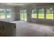 New living room under construction with large windows and sliding glass doors at 1010 Black Locust Pl., Longs, SC 29568