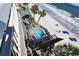 Elevated view of beach access, hot tub and sun deck from condo balcony at 1012 N Waccamaw Dr. # 305, Garden City Beach, SC 29576