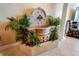 Indoor water fountain with lush greenery, adding a touch of nature and tranquility to the home at 1012 N Waccamaw Dr. # 305, Garden City Beach, SC 29576