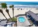 Beautiful elevated view of hot tub with beach and ocean in the background at 1012 N Waccamaw Dr. # 305, Garden City Beach, SC 29576
