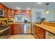 Spacious kitchen with granite countertops, stainless steel appliances, and plenty of storage at 1012 N Waccamaw Dr. # 305, Garden City Beach, SC 29576