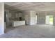 Unfinished interior with drywall and white cabinets offers a blank canvas for customization and modern design at 1014 Black Locust Pl., Longs, SC 29568