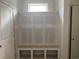 Mud room features storage bench and cabinets; an unfinished space with white walls, a blank canvas for organization at 1014 Black Locust Pl., Longs, SC 29568