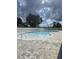 Community swimming pool features a modern design with a brick-paved sundeck, and plenty of lounge chairs at 1014 Black Locust Pl., Longs, SC 29568