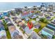 Aerial view showcases the beach house's location near the ocean and surrounding neighborhood at 121 Easy St., Garden City Beach, SC 29576