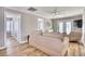 Relaxing living space with wood floors, soothing decor, and access to outdoor patio at 121 Easy St., Garden City Beach, SC 29576