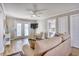 Serene living space boasting wood floors, ample seating, and natural light at 121 Easy St., Garden City Beach, SC 29576