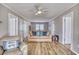 Cozy living room featuring wood floors, neutral tones, and casual furniture at 121 Easy St., Garden City Beach, SC 29576