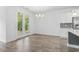Bright dining area with french doors leading to the outside and views of the backyard at 124 Castaway Key Dr., Pawleys Island, SC 29585