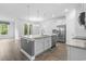Kitchen with a center island, stainless appliances, granite countertops, and ceramic tile flooring at 124 Castaway Key Dr., Pawleys Island, SC 29585