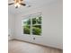 Bedroom featuring a large window that provides natural light and backyard view at 124 Shady Arbor Loop, Longs, SC 29568