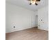This bedroom is spacious and features a ceiling fan, and bright wood-look flooring at 124 Shady Arbor Loop, Longs, SC 29568