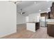 Open-concept kitchen boasts an island with granite counters, stainless steel appliances, and recessed lighting at 124 Shady Arbor Loop, Longs, SC 29568
