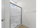 Modern bathroom features a glass-enclosed shower with bright, white tile at 124 Shady Arbor Loop, Longs, SC 29568
