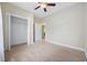 Neutral bedroom with carpet, ceiling fan, and a closet at 1304 Marley St., Conway, SC 29527