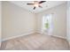Neutral bedroom with carpet, ceiling fan, and white curtains at 1304 Marley St., Conway, SC 29527