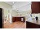 Bright kitchen with wood cabinets, stainless steel appliances, and an open layout at 1304 Marley St., Conway, SC 29527