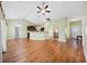Spacious living room with wood floors seamlessly connects to the kitchen and dining areas at 1304 Marley St., Conway, SC 29527