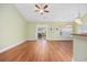 Open-concept living room with wood floors connects to the outdoor patio at 1304 Marley St., Conway, SC 29527