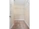 Walk-in closet featuring installed shelving and neutral carpet at 1304 Marley St., Conway, SC 29527