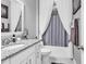 Elegant bathroom featuring granite countertops, white cabinetry, and a shower-tub combination with curtain at 136 Crabapple Dr., Longs, SC 29568
