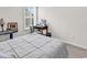 Bedroom featuring neutral tones, a comfortable bed, and a workspace with a desk and chair at 136 Crabapple Dr., Longs, SC 29568