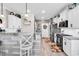 Charming kitchen with stainless steel appliances and white cabinetry at 136 Crabapple Dr., Longs, SC 29568