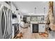 A modern kitchen flows into the living area, featuring granite countertops at 136 Crabapple Dr., Longs, SC 29568