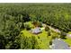 Aerial view of a home nestled among the trees at 1478 Bluegil Dr., Longs, SC 29568