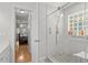 Beautiful bathroom featuring a glass shower and a view into the main bedroom at 1478 Bluegil Dr., Longs, SC 29568