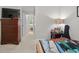 Bedroom featuring a tall dresser, doorway, and interior decor at 1478 Bluegil Dr., Longs, SC 29568