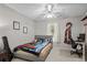 Cozy bedroom with neutral walls, ceiling fan, and comfortable bed at 1478 Bluegil Dr., Longs, SC 29568