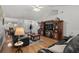 Open living room features hardwood floors, vaulted ceilings, and comfortable seating for relaxing and entertaining at 1478 Bluegil Dr., Longs, SC 29568