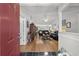 Inviting open-concept living area with hardwood floors and vaulted ceilings at 1478 Bluegil Dr., Longs, SC 29568