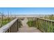 Scenic boardwalk leading to sandy beach and ocean views at 1605 S Ocean Blvd. # 1403, Myrtle Beach, SC 29577