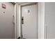 Hallway shot of two doors, one labeled with unit number 1403 at 1605 S Ocean Blvd. # 1403, Myrtle Beach, SC 29577