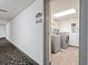 Bright laundry room with modern washer and dryer at 1605 S Ocean Blvd. # 1403, Myrtle Beach, SC 29577