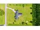 Aerial view of the property showcasing the home's layout, landscaping, and expansive lot at 1752 Patriot Ct., Mullins, SC 29574