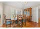 Elegant dining room with hardwood floors, natural light, and traditional furniture at 1752 Patriot Ct., Mullins, SC 29574