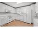 Eat-in kitchen with bright white cabinets and stainless steel appliances at 1752 Patriot Ct., Mullins, SC 29574