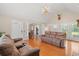 Bright living area with hardwood floors, ample seating, and natural light at 1752 Patriot Ct., Mullins, SC 29574