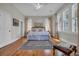 Inviting bedroom featuring hardwood floors, ample natural light, and neutral decor for a serene retreat at 179 Cottage Ct., Pawleys Island, SC 29585