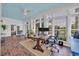 Bright home office with many windows, a view of the pond and blue accents at 179 Cottage Ct., Pawleys Island, SC 29585