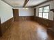 Open living room showcasing hardwood floors and a cozy ambiance at 189 Lewis Rd., Hemingway, SC 29554