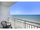 Bright balcony view with ocean view and seating to enjoy the beach at 2000 N Ocean Blvd. # 1810, Myrtle Beach, SC 29577