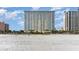Beachfront resort exterior highlighting modern design and panoramic views of the ocean at 2000 N Ocean Blvd. # 1810, Myrtle Beach, SC 29577