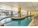 Indoor lazy river featuring a winding waterway surrounded by inviting lounge chairs at 2000 N Ocean Blvd. # 1810, Myrtle Beach, SC 29577