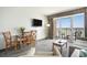 Inviting living room with balcony showcasing ocean views with seating at 2000 N Ocean Blvd. # 1810, Myrtle Beach, SC 29577